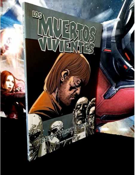 CASI EXCELENTE ESTADO LOS MUERTOS VIVIENTES 6 ESTA TRISTE VIDA PLANETA TOMO TAPA BLANDA
